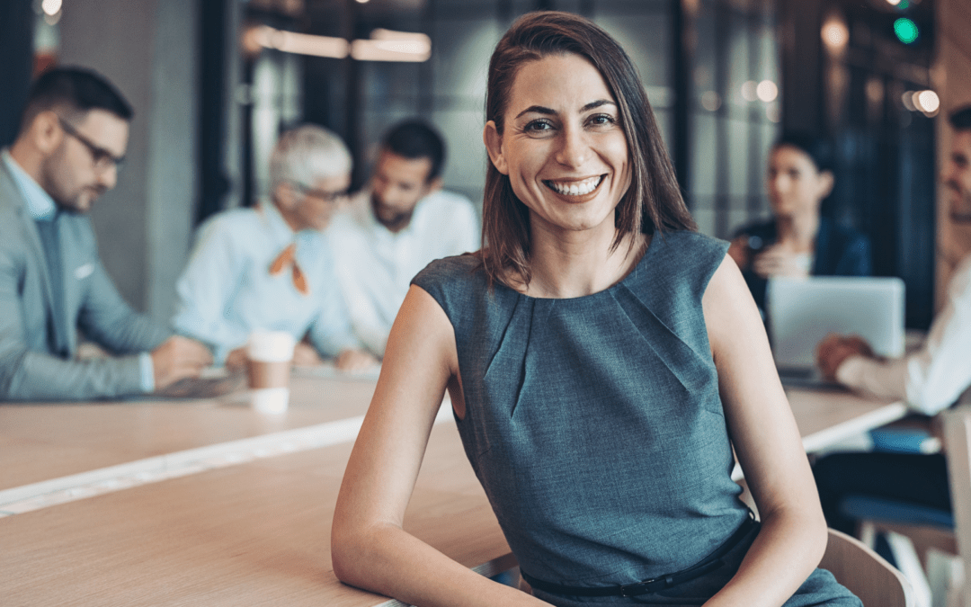 business leader standing in a modern office environment